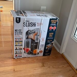 Ninja Slushie Machine with Black and Orange Accents